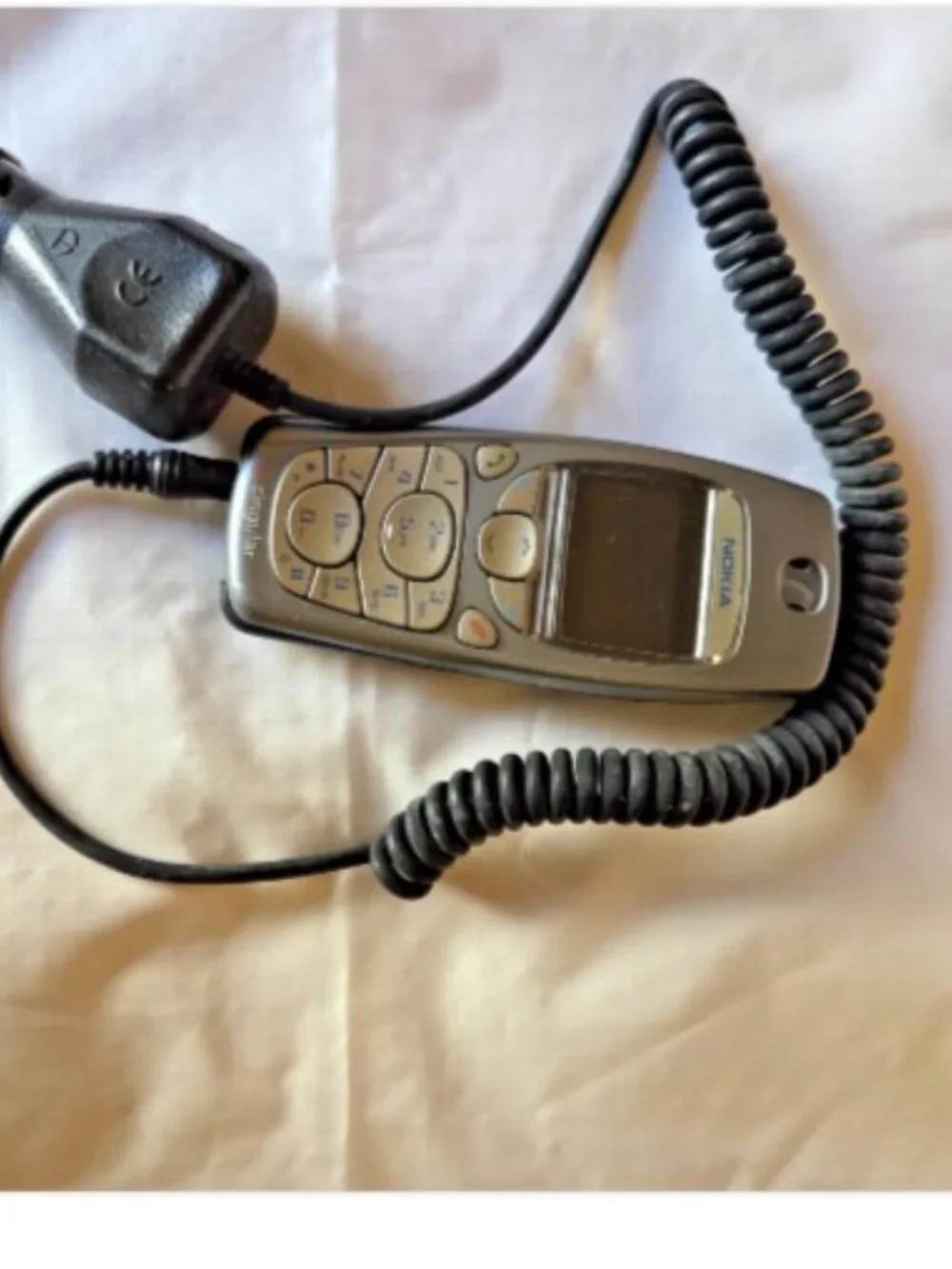 3 older cell phones-Nokia, Motorola, and Samsung